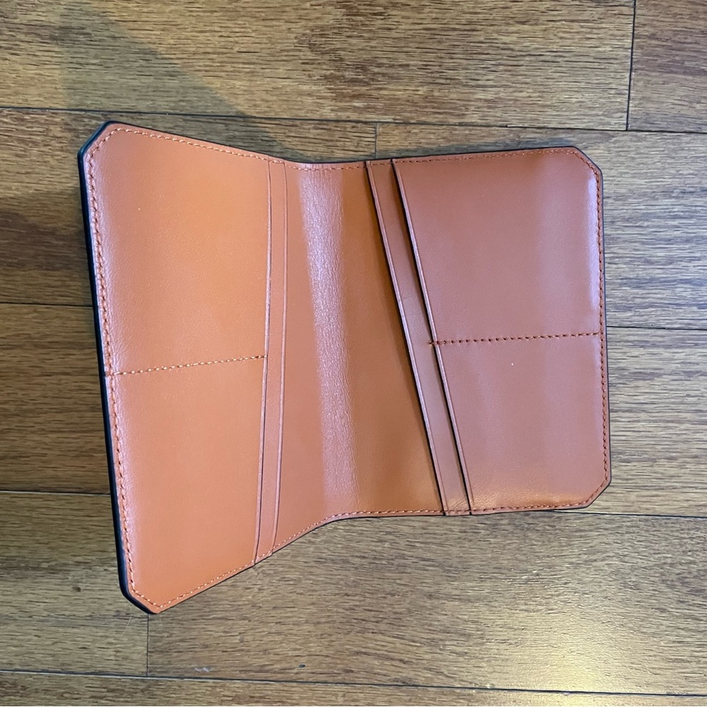 Tumi Leather Passport Holder. Barely used.